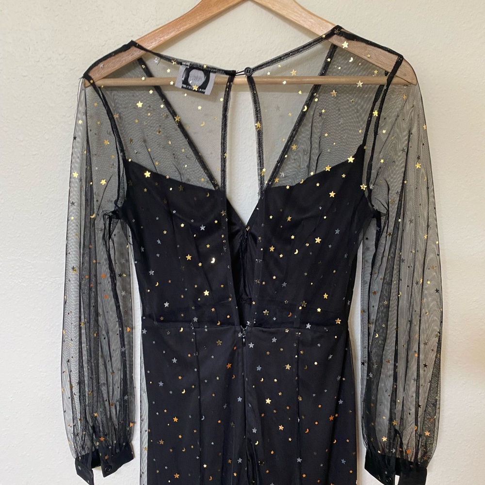 Black full length star dress.